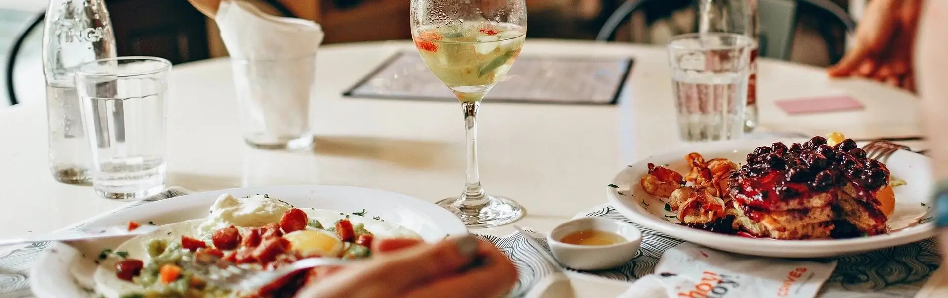 A table with food and wine on it